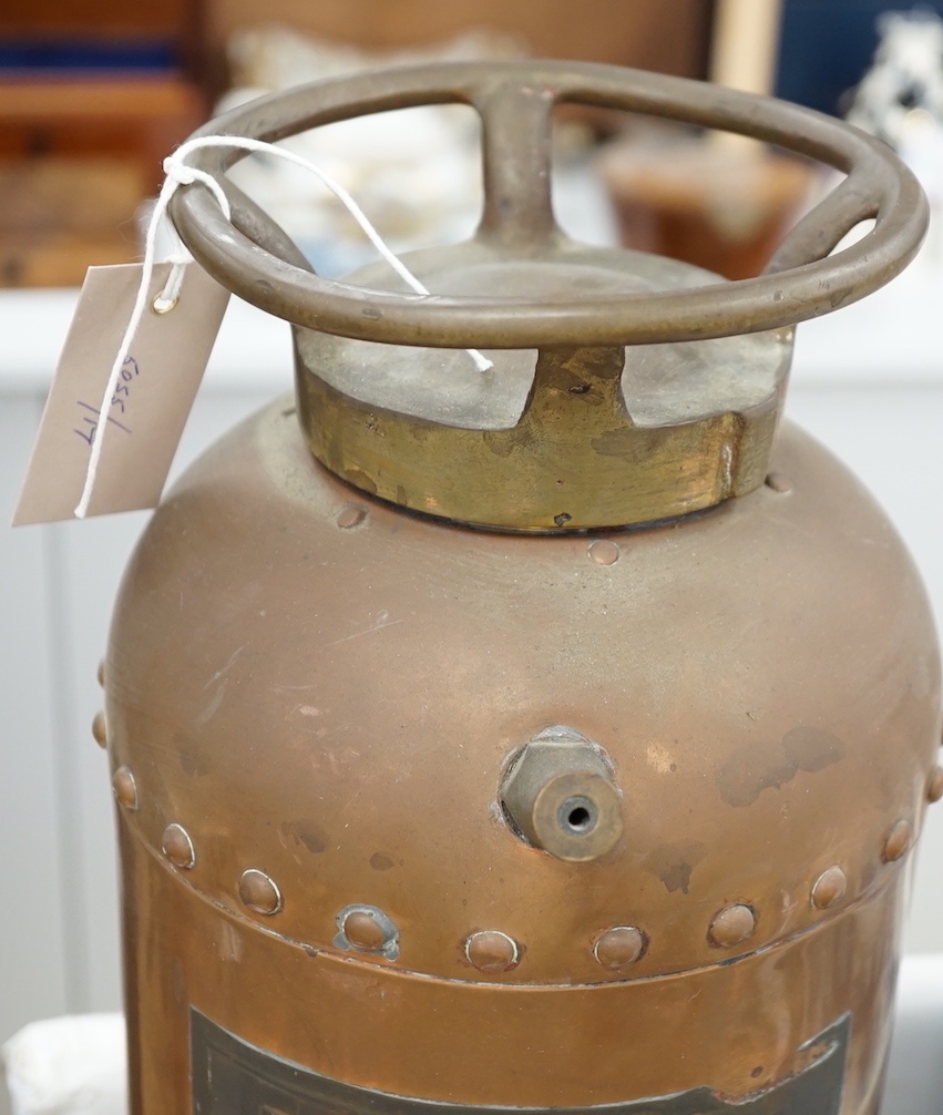 A Spanish copper fire extinguisher, 60cm